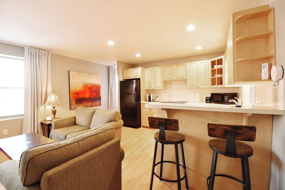 Bower on Lester One Bedroom  | Living area | Flat-screen TV