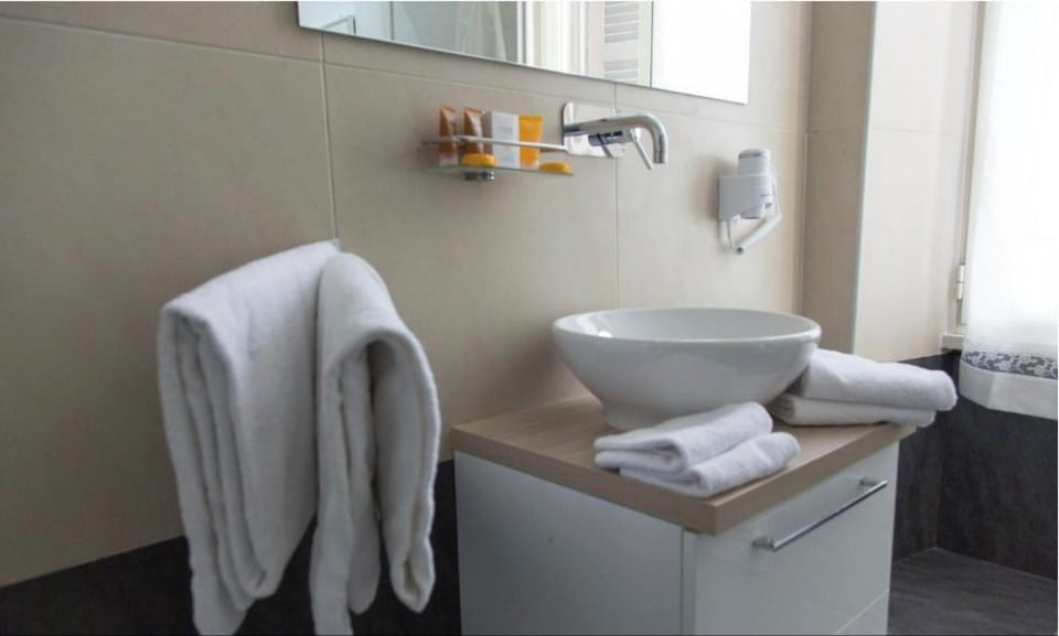 Bathroom | Shower, hair dryer, bidet, towels