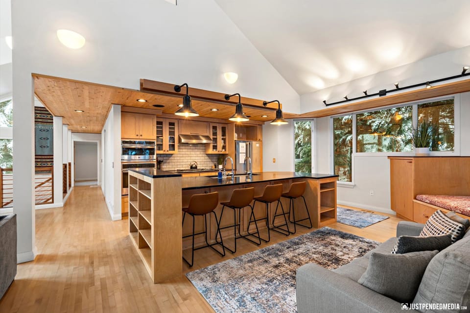 Bar, bench, and sofa area in kitchen