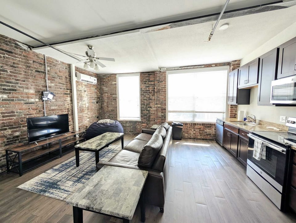 The cozy living room is designed for relaxation and entertainment.