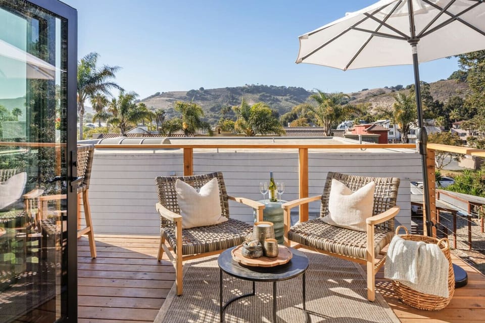 Expansive private deck with beautiful hillside views