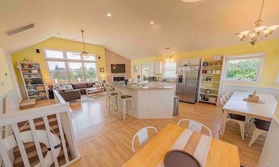 Large dining area with seating for group meals and family game nights.