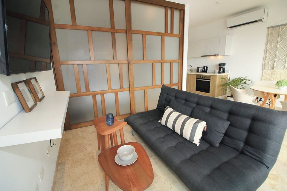 Comfort Apartment, 1 King Bed with Sofa bed, Balcony | Living area | 45-inch flat-screen TV with digital channels