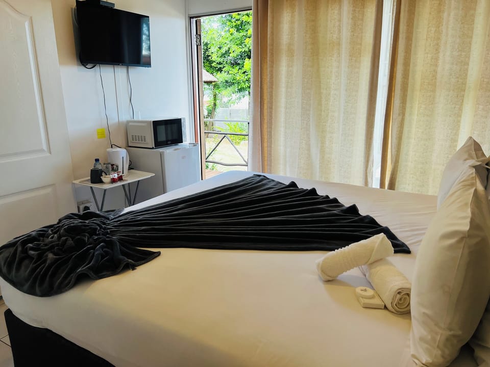 Superior Double Room, Balcony, Garden View | Premium bedding, desk, laptop workspace, blackout drapes