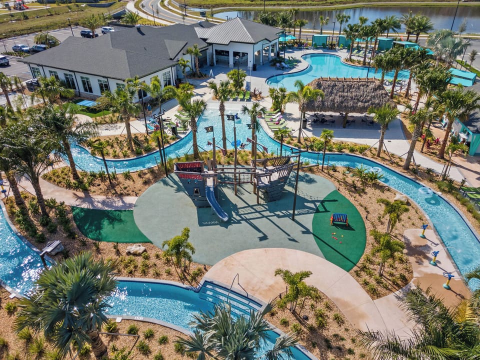 New Bronson Club with lazy river, pool, and playscape. - 12 minute walk