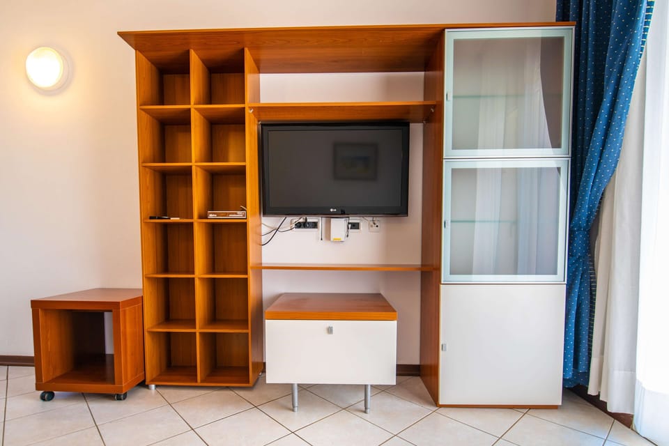 Classic Apartment, 1 Bedroom, Balcony | Living area | TV
