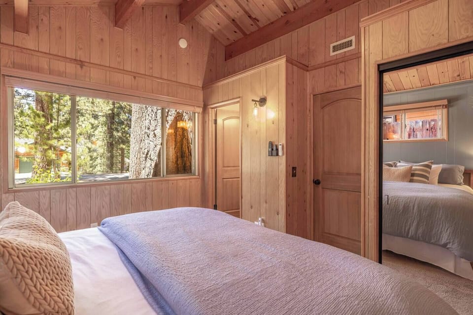 Look out at the pines. En suite bathroom attached.