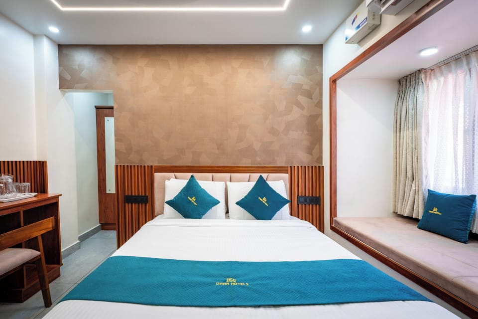 Deluxe Double Room, City View | Desk, laptop workspace, soundproofing, iron/ironing board