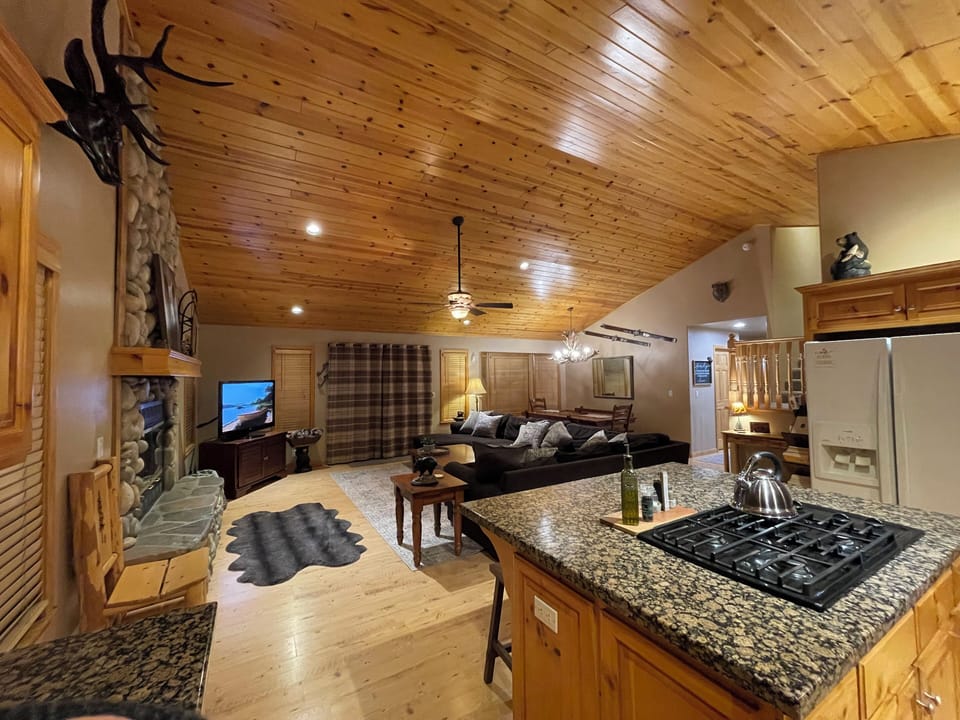 Great room and kitchen. High ceilings