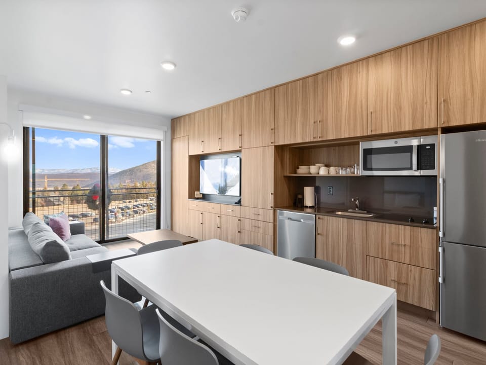 Dining, living, full kitchen, and lovely views