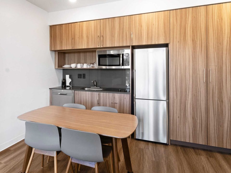 Dining table and full kitchen for game night or meals!