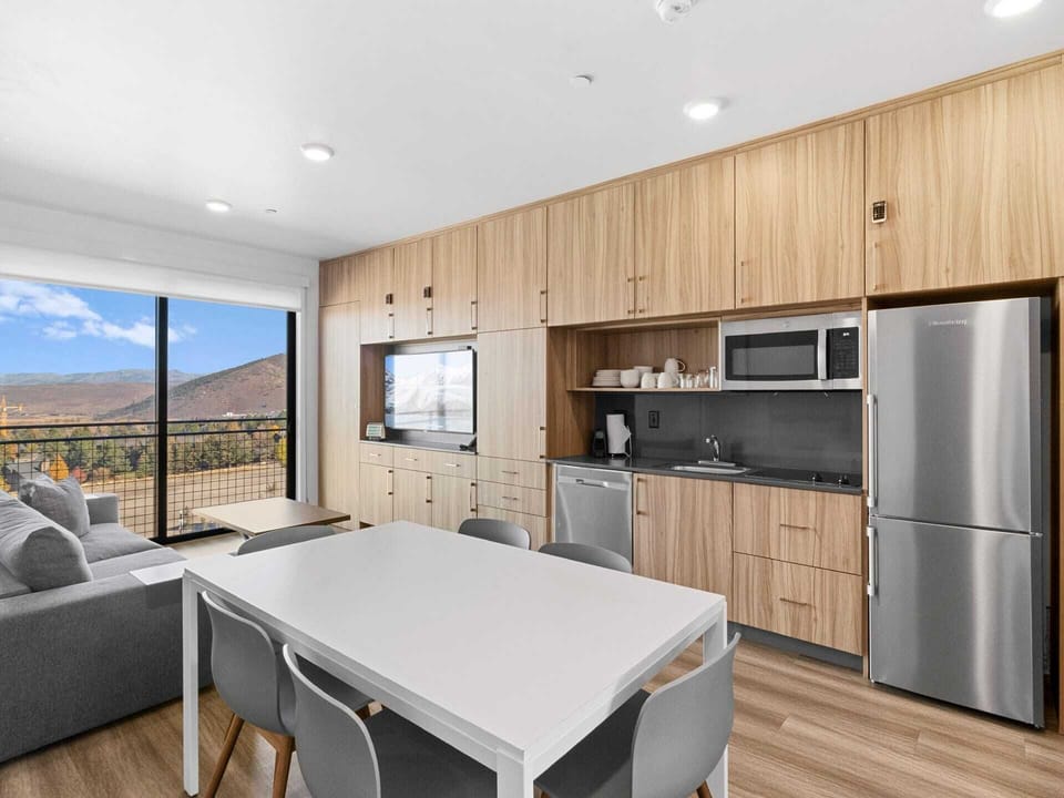 Dining, living, full kitchen, and lovely views