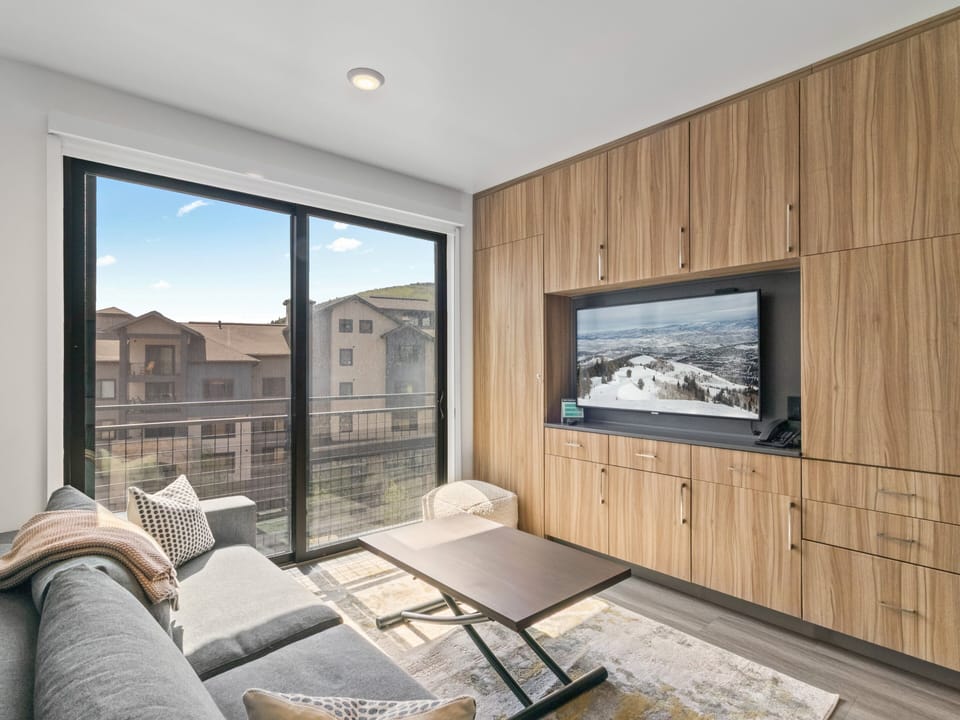 Studio living area with queen Murphy bed