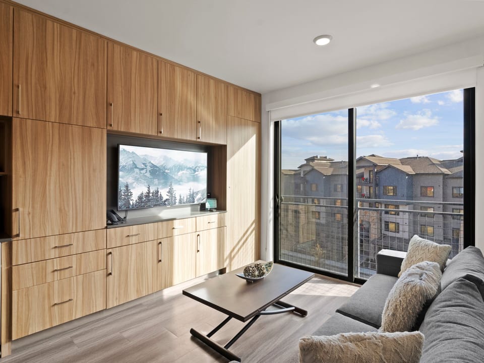 Studio living area with queen Murphy bed