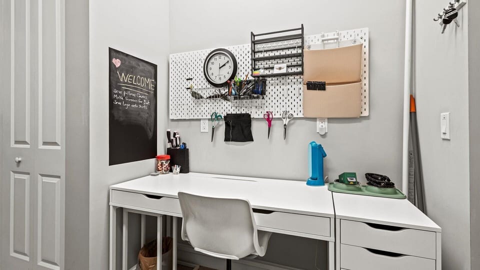 A workstation is provided in the laundry room for the vacationers that need some productive time at the desk.