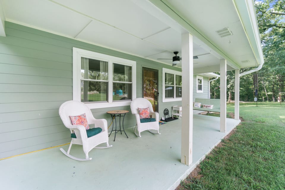 Covered porch with swing & rocking chairs for crisp coffee + quiet mountain air