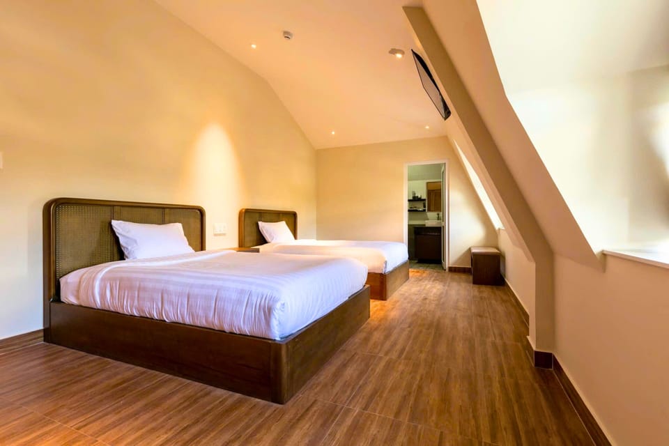 Deluxe Quadruple Room, 2 Queen Beds, Hill View | Desk, laptop workspace, free WiFi