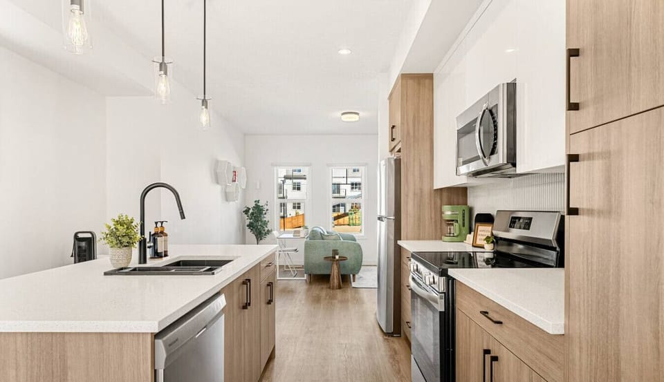 Fully equipped kitchen featuring modern appliances and ample counter space