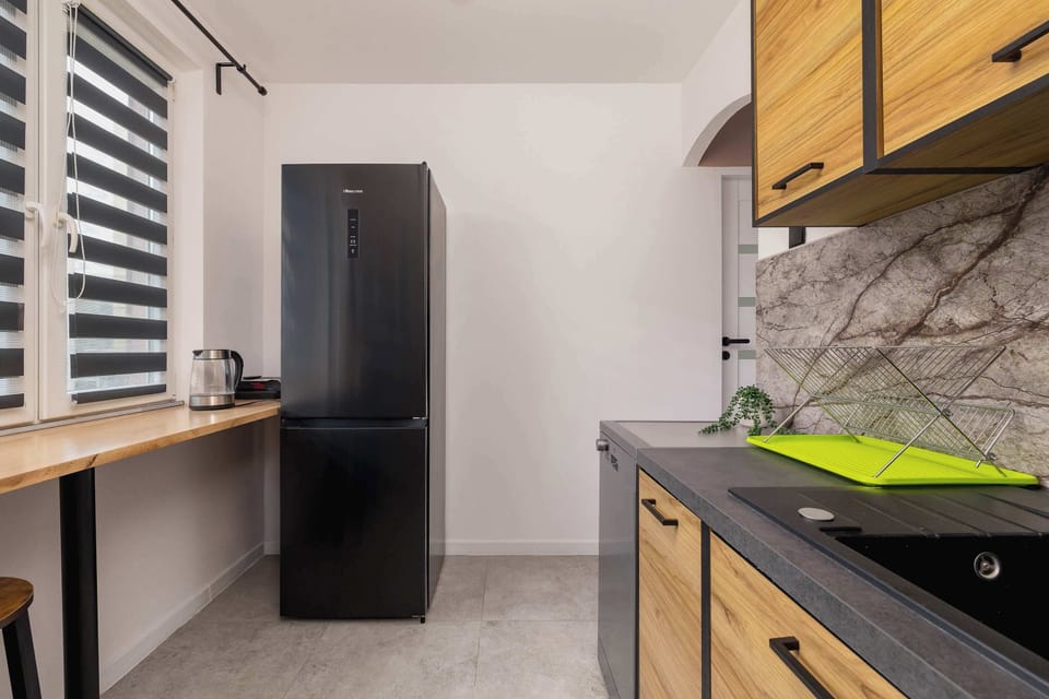 The kitchen's bright space is perfect for preparing meals.