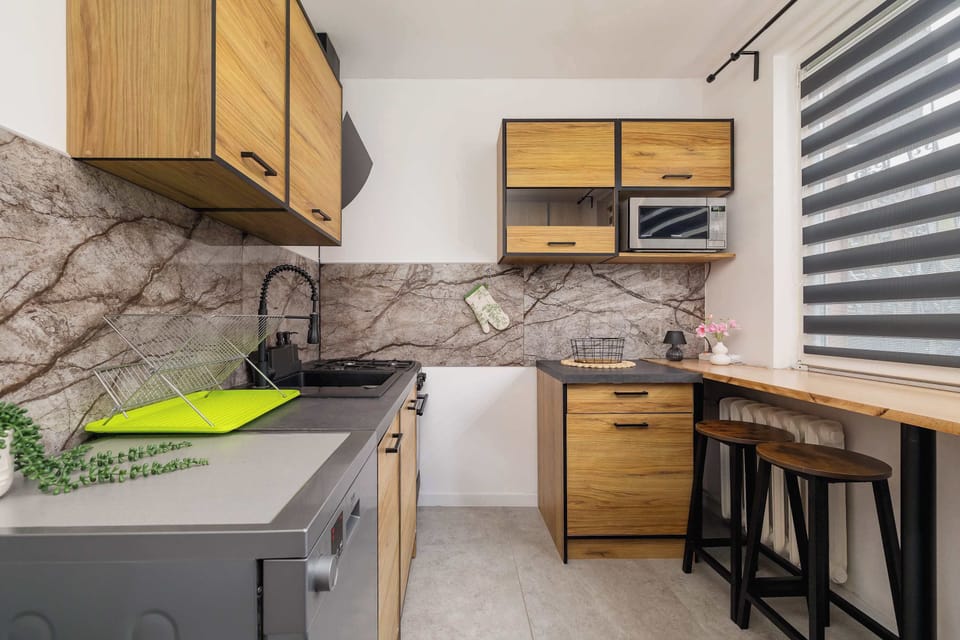 The kitchen features a stylish and functional design.