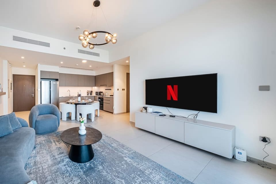 Step into a bright, open-plan living area designed for both comfort and style.