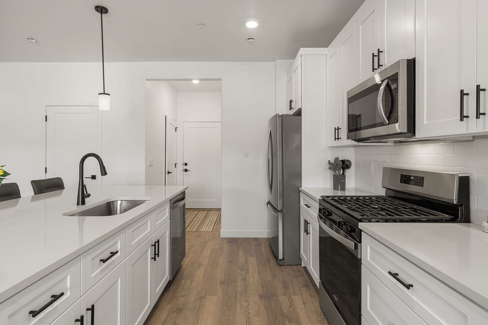 Townhome, 4 Bedrooms | Private kitchen | Coffee/tea maker, fridge, oven, toaster