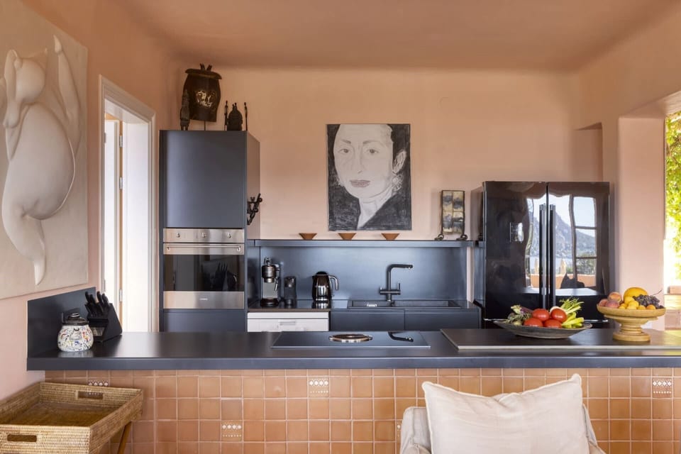 The sleek contemporary kitchen.