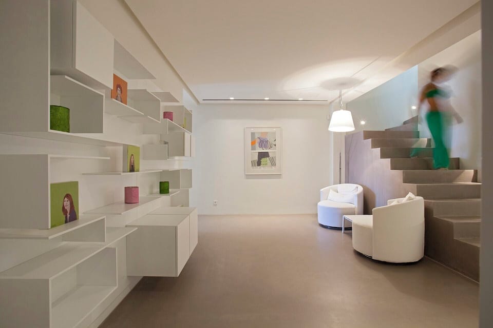 The hallway on the lower ground floor, from which the three bedrooms are accessed.