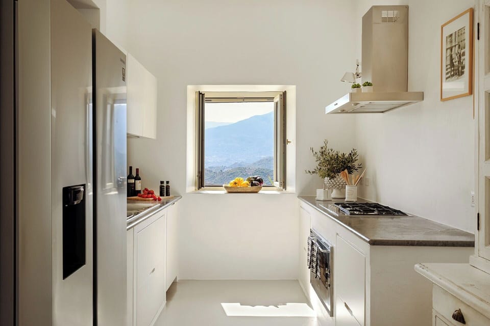 The well-equipped kitchen offers more of those glorious views.