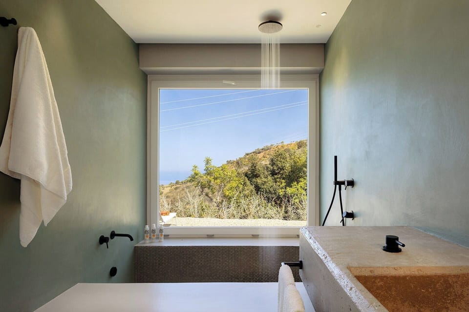 Its en-suite bathroom has a sunken tub and a rainfall shower.