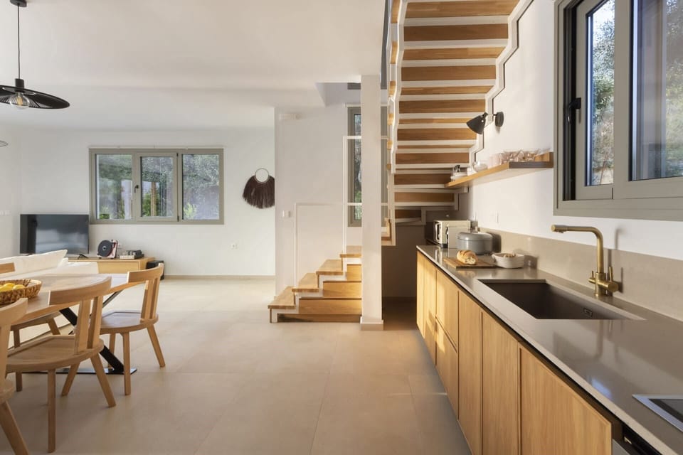 The well-equipped kitchen and dining area.