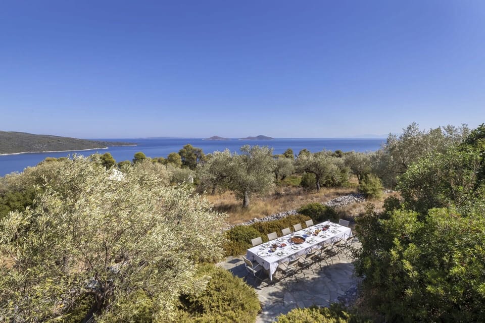 Spellbinding views out across Adelphia's extensive grounds to the sea.