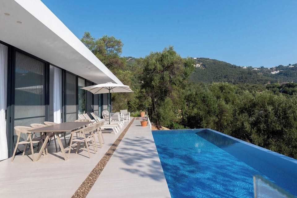 The main terrace flanks the sea-facing side of the house.