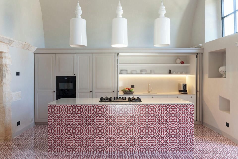 The super kitchen, with its colourful tiles and its airy space.