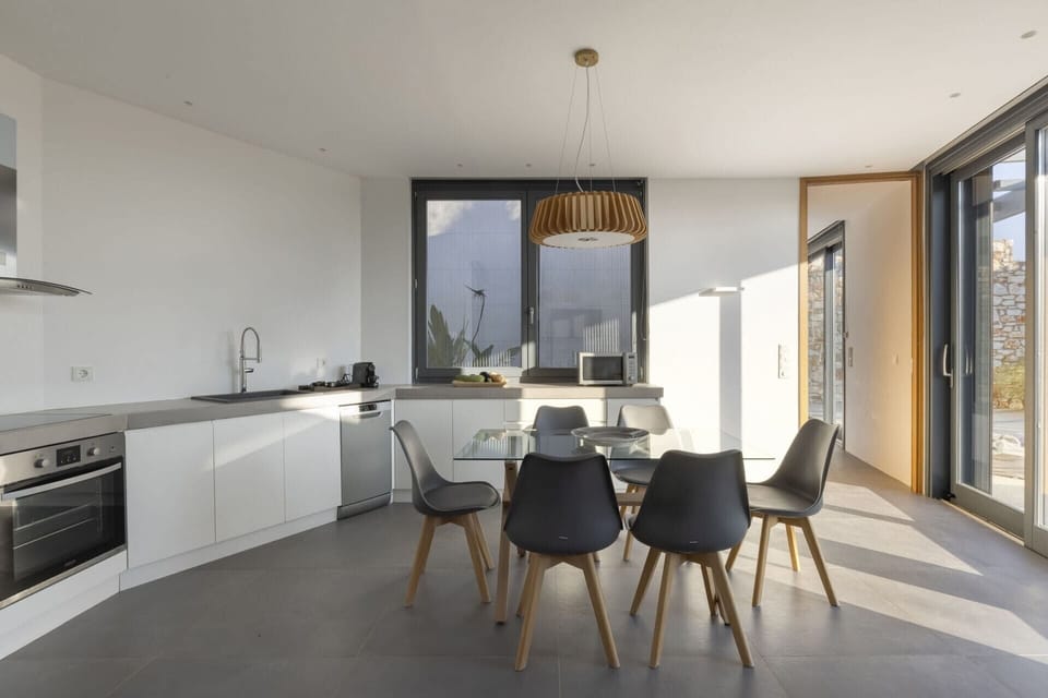 The bright dining kitchen of the Earth House.