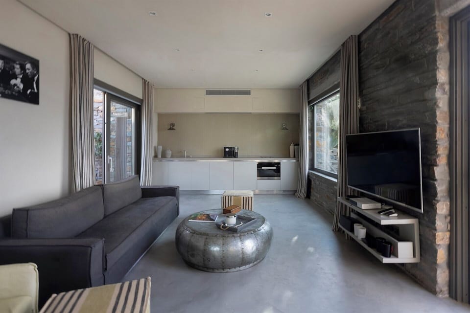 The second suite's open-plan space incorporates a kitchen.