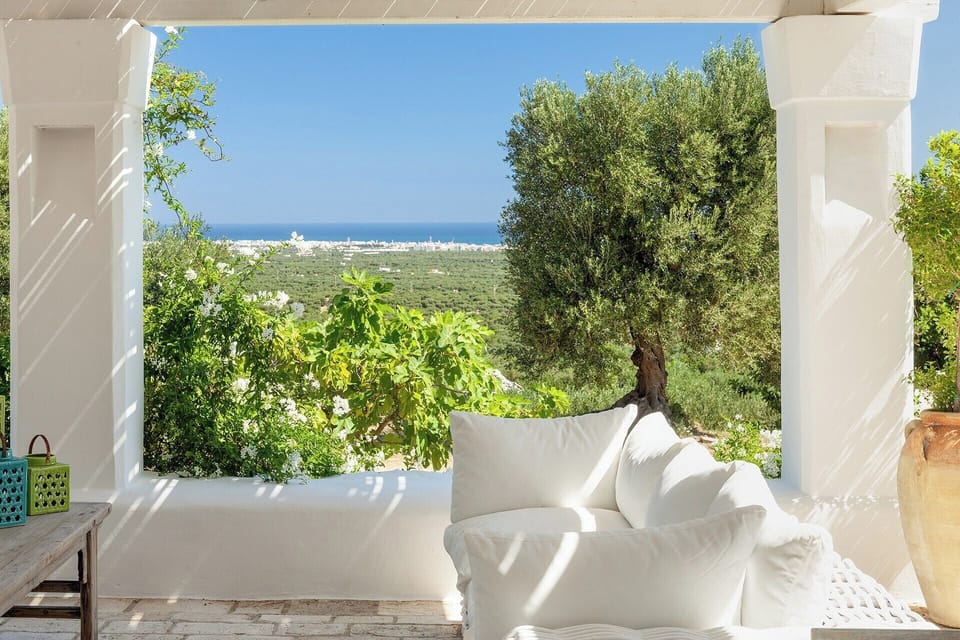 The main, shady terrace area with views down towards the sea.