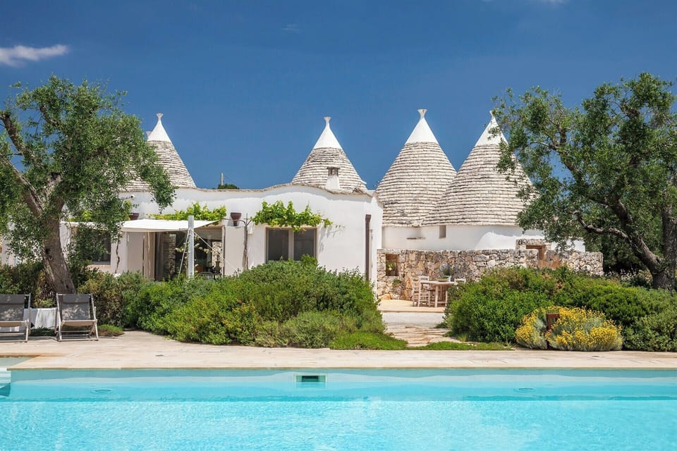 The pool and gardens with Trullo Gaura behind.