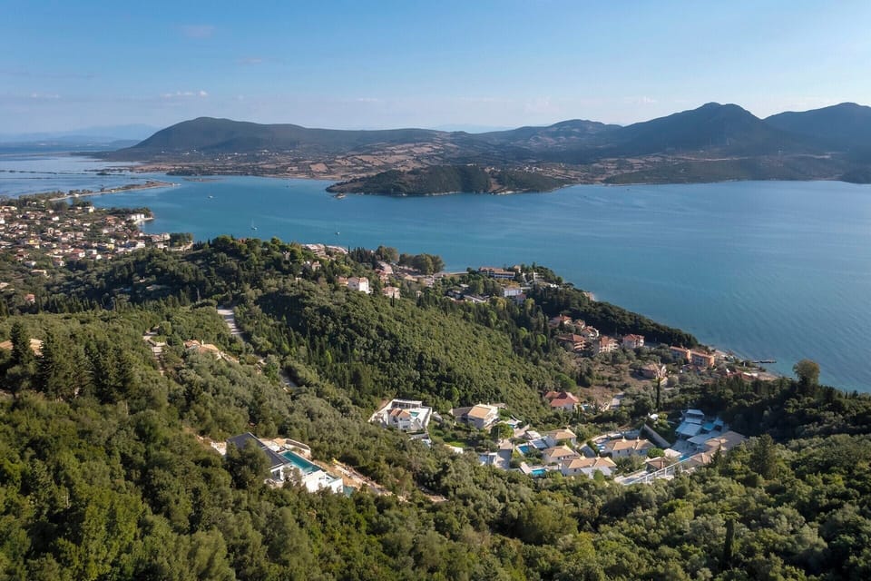 Casa Rosemary (bottom left) perches in a panoramic position amidst the greenery of Lefkada's east coast.