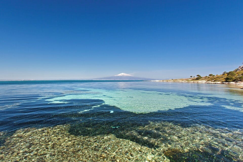 Fancy a swim? Fabulous views of Mount Etna seen from Azzurra.