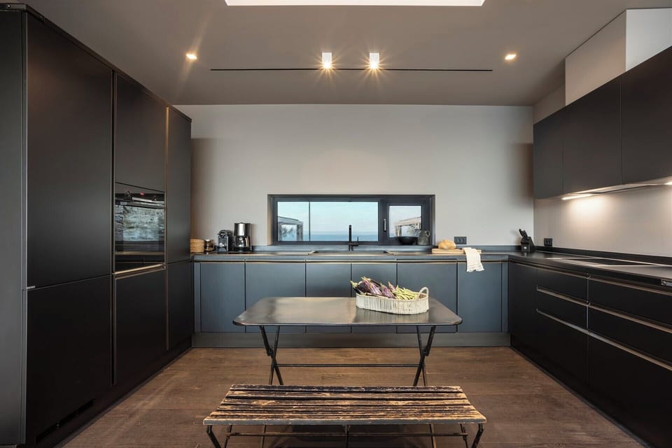The beautifully designed and skillfully crafted kitchen-diner in the main house.