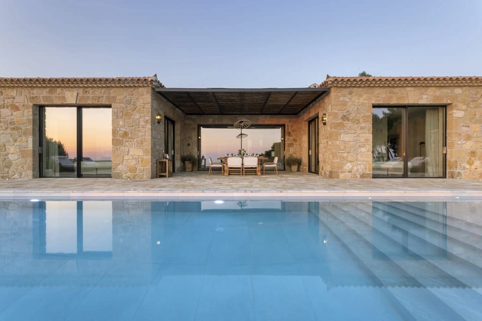 Estrella's telescopic wings - each home to a bedroom - seen from by the pool.