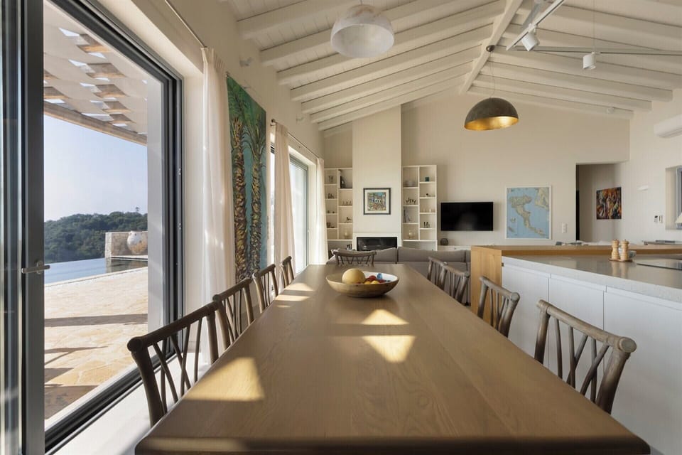 The open-concept communal space with its lofty beamed ceilings.