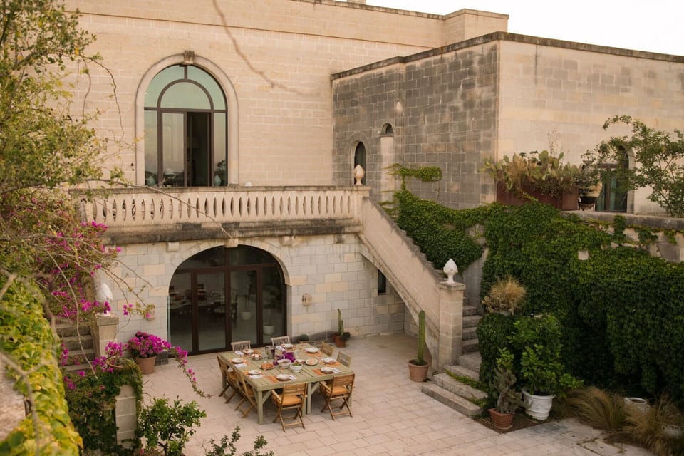 The east-facing side of the house with its secret sunken courtyard garden.
