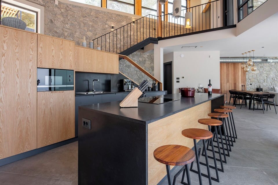 The contemporary kitchen is the hub of the house.