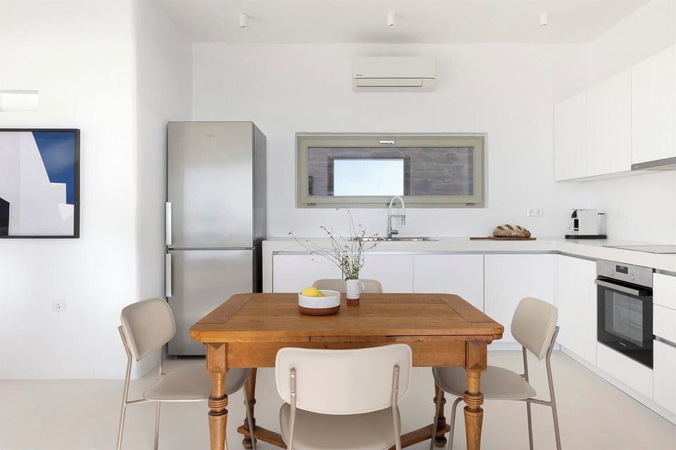 The modern kitchen and dining area.