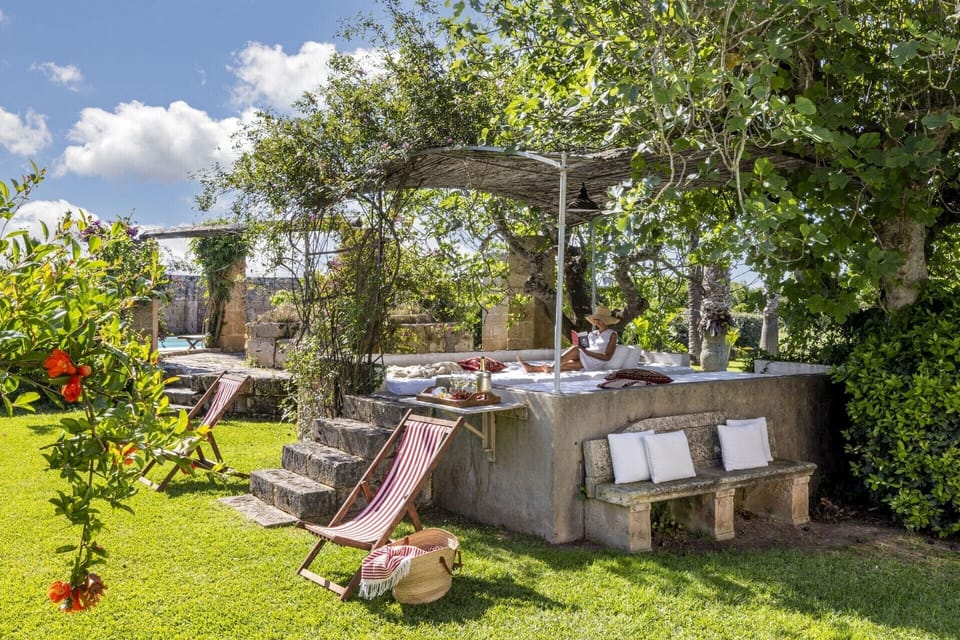A shady lounging area in the gardens.
