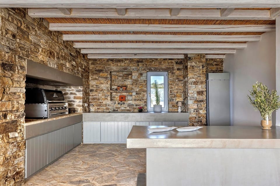 The outdoor kitchen of the first house.
