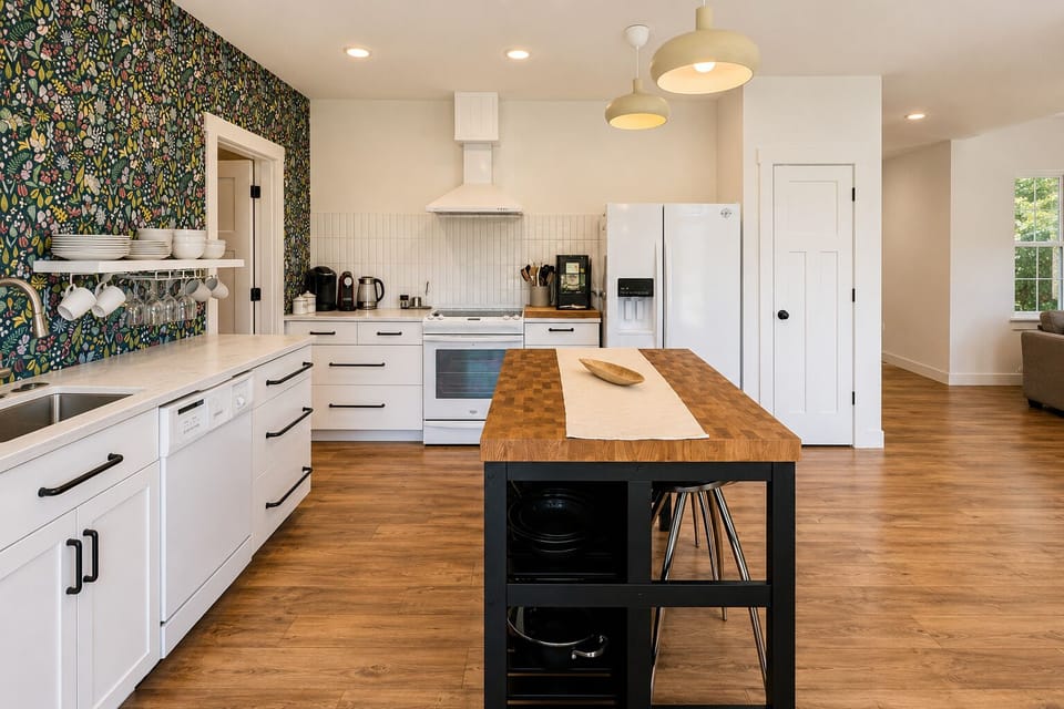 Full Kitchen includes eat up bar with stools, dishwasher and coffee station.