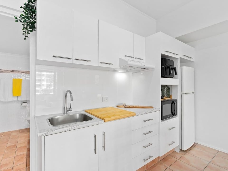 Kitchenette has fridge, microwave, air fryer, coffee machine and cooktop onsite.